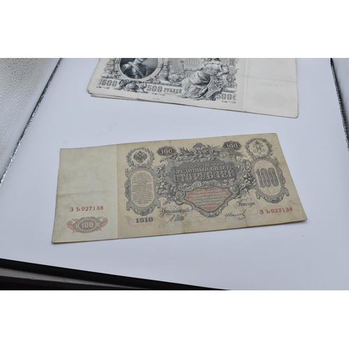 155 - A collection of 19th century and later banknotes to include a 1898 and 1910 Russian 100 Rubles depic... 