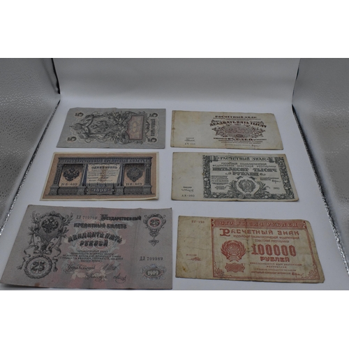 155 - A collection of 19th century and later banknotes to include a 1898 and 1910 Russian 100 Rubles depic... 