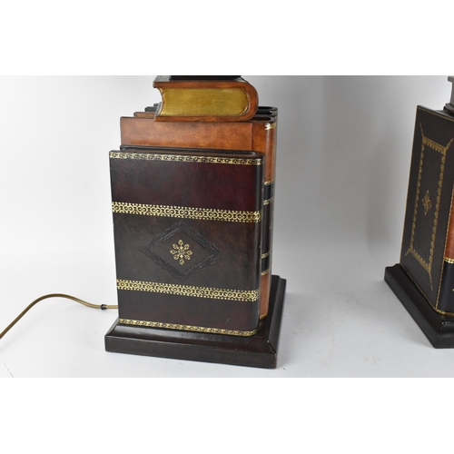 178 - A pair of Maitland-Smith faux book table lamps, with matching chamfered design shades with gilt tool... 