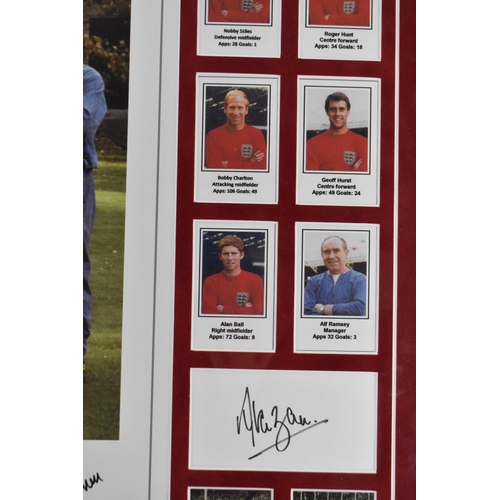 191 - A 1966 World Cup photograph of the England team, signed by eleven footballers part of the team, alon... 