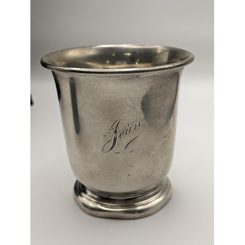 129 - A mid 20th century silver Christening mug, engraved with the name 'Jean', hallmarked Sheffield 1940
... 