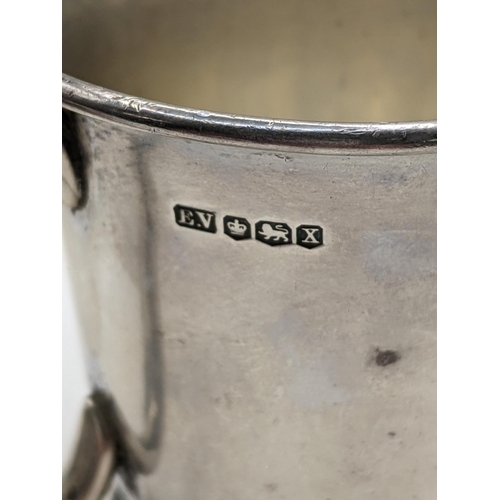 129 - A mid 20th century silver Christening mug, engraved with the name 'Jean', hallmarked Sheffield 1940
... 