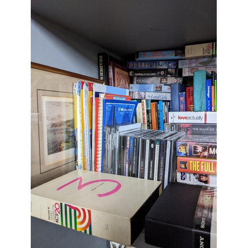 135 - Books-A quantity of books, framed and glazed prints, DVD'S, CD's and original video cassettes to inc... 