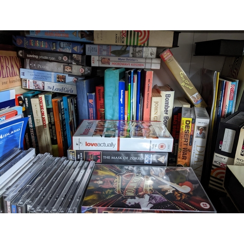 135 - Books-A quantity of books, framed and glazed prints, DVD'S, CD's and original video cassettes to inc... 