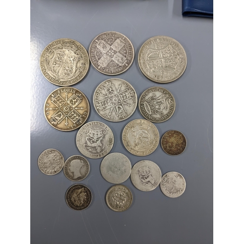 145 - Coins-British and World coinage to include pre 1947 half crowns, florins, shillings and sixpences. L... 