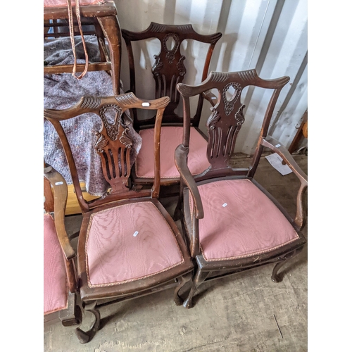 169 - An early 20th century mahogany Chippendale style two seater chair together with six matching chairs
... 