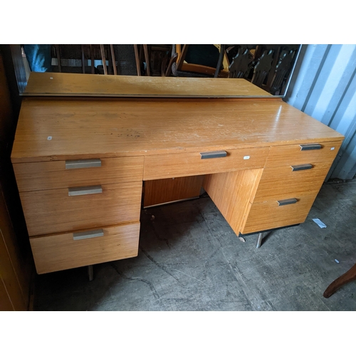 174 - A mid 20th century Stag John & Sylvia Reed dressing table, 118cm h x 127cm w, together with matching... 