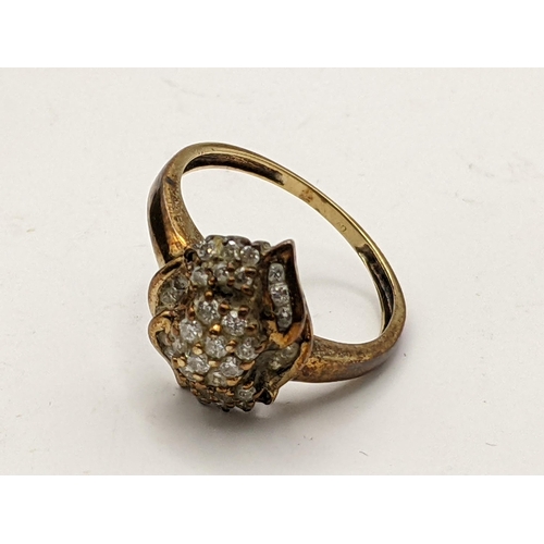 224 - A 9ct gold diamond cluster ring, 2.4g
Location:CAB5