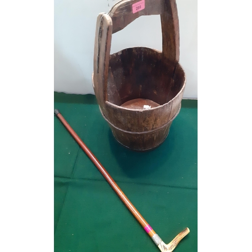 288 - A 19th century wooden pail with metal strapwork together with a horn handled wooden walking stick wi... 