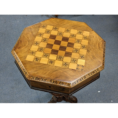 306 - A Victorian walnut trumpet formed sewing table having a marquetry chequerboard top and on cabriole l... 