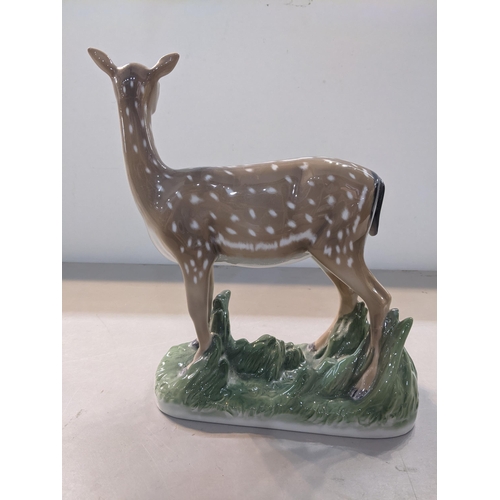 310 - A Copenhagen model of a doe, numbered 465 to the base, 27cmHigh x 21cm Wide. Location:6.1