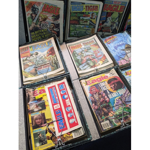 348 - A large collection of Eagle comics, dating from 1983-1992, contained in 12 box files. Location:LWB