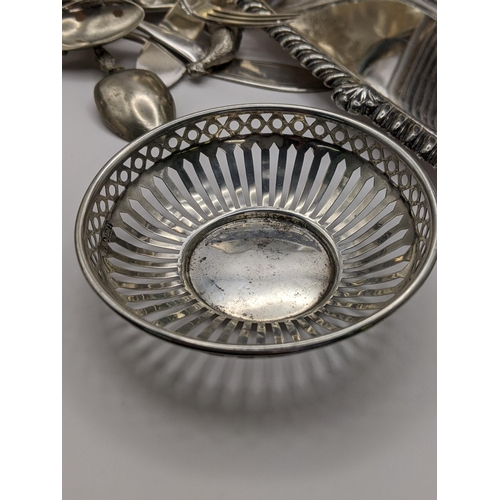 53 - Silver comprising a bonbon dish 21g and silver plate to include flatware, dishes and collectables. L... 