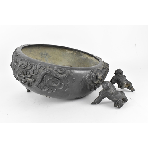 20 - A Chinese bronzed cast metal jardiniere, late 19th/early 20th century, of circular form designed wit... 