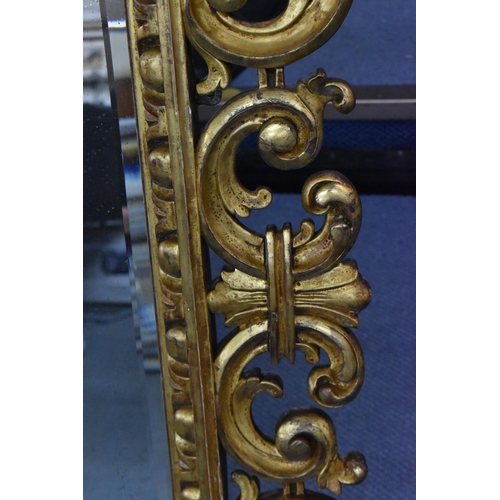 226 - A 19th century Italian giltwood mirror, the square bevelled glass within a c-scroll acanthus frame w... 