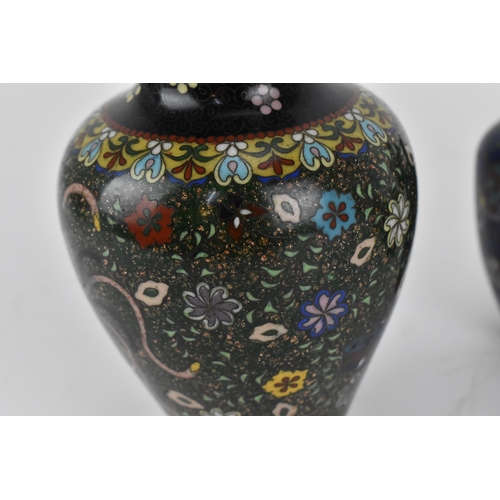 234 - A small collection of Japanese cloisonne enamel vases, Meiji period, comprising a larger vase decora... 