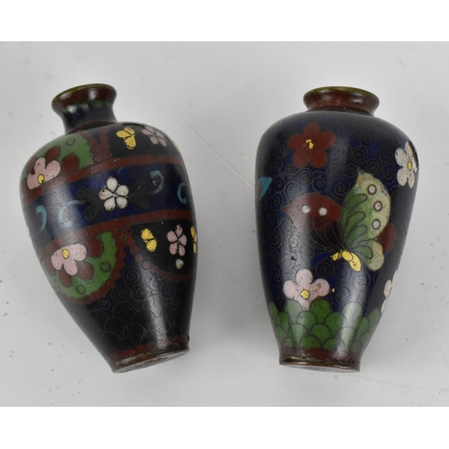 234 - A small collection of Japanese cloisonne enamel vases, Meiji period, comprising a larger vase decora... 