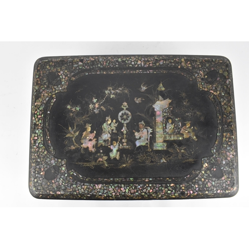 27 - A Chinese export black lacquer and mother-of-pearl inlaid jewellery casket, of rectangular form with... 