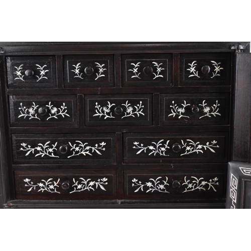 28 - A Chinese hardwood and bone inlay table cabinet, c.1900, the top section with two tiered shelving in... 