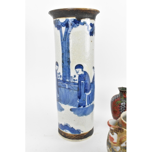 90 - A small collection of Oriental works, comprising a Chinese crackle glazed blue and white cylindrical... 