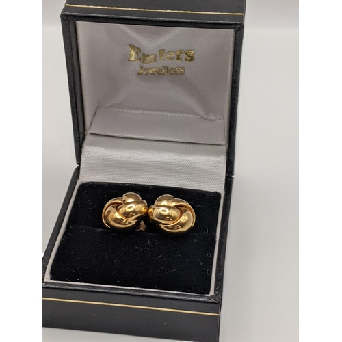 108 - A boxed pair of 18ct gold ear studs 3.1g, together with a 14t gold necklace, 0.6g and a pin badge wi... 