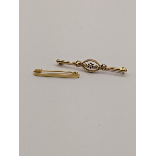 15 - An 18ct gold brooch 1.7g, together with a yellow metal brooch set with a diamond, total weight 3.5g ... 