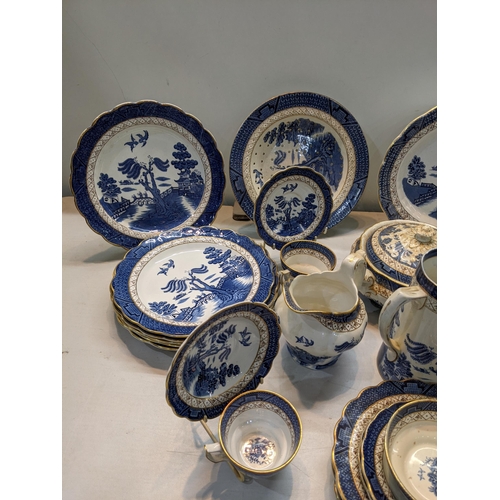 167 - A Booths dinner a tea service in the blue and white, Real Old Willow Pattern to include tureen, sauc... 