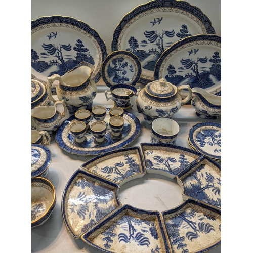 167 - A Booths dinner a tea service in the blue and white, Real Old Willow Pattern to include tureen, sauc... 