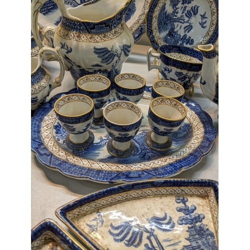 167 - A Booths dinner a tea service in the blue and white, Real Old Willow Pattern to include tureen, sauc... 