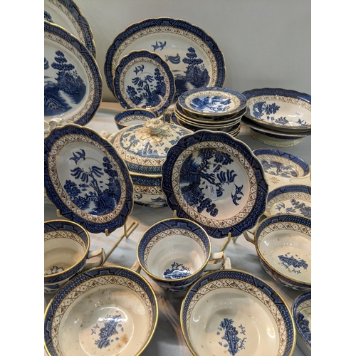 167 - A Booths dinner a tea service in the blue and white, Real Old Willow Pattern to include tureen, sauc... 