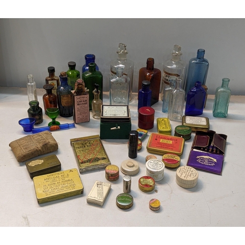 171 - A collection of pharmaceutical to include Victorian and later glass medicine bottles to include pota... 