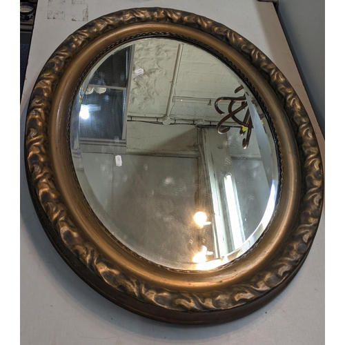 173 - An early 20th century gilt moulded oval mirror
Location:A2F