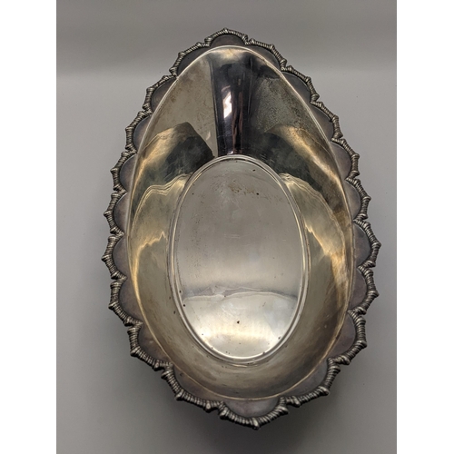 18 - A silver navette shaped dish engraving hallmarked London 1903, total weight 328.2g Location:11.2