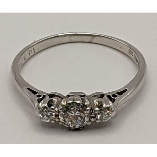 190 - A 18ct white gold three stone ring set with diamonds, total weight, 2.5g
Location:RING