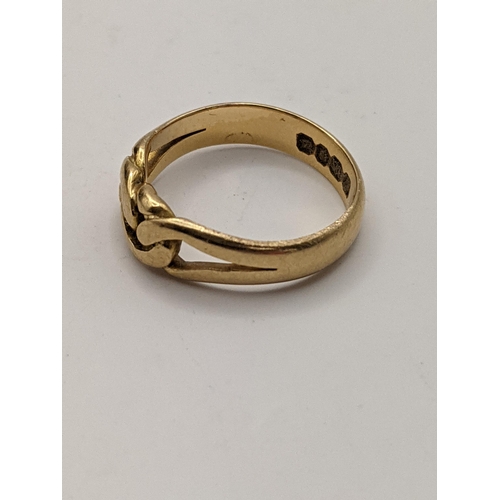 282 - A yellow metal entwined ring, total weight 3.6g Location:RING