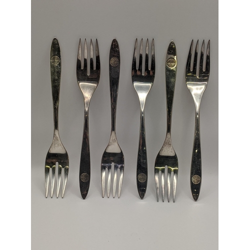 29 - Six Pan-Am-Pan American Airways International silver forks, total weight, 185.9g
Location:TABLE1