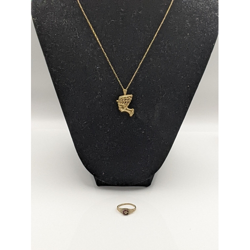 45 - A 9ct gold Egyptian head pendant and chain, and a 9ct gold diamond and ruby set ring 5g Location:CAB... 