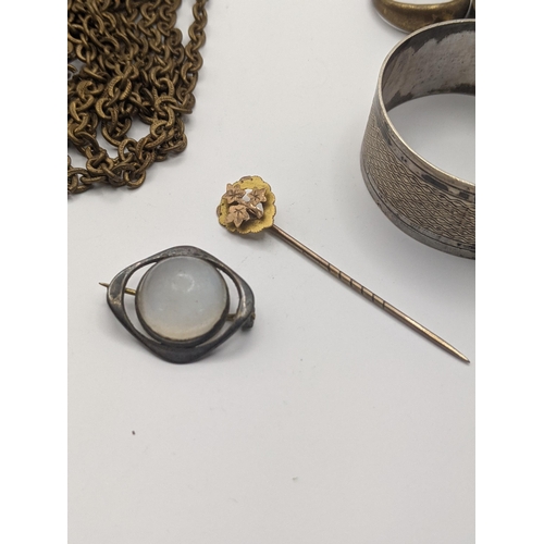 50 - A mixed lot to include a 9ct gold stick pin, together with a silver matchbox holder hallmarked Birmi... 