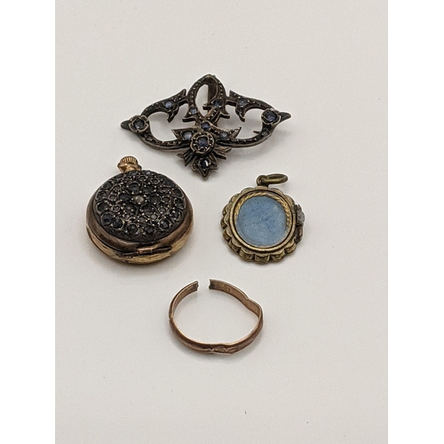 62 - Victorian and later jewellery to include an old cut diamond and sapphire fob watch, a locket, a broo... 