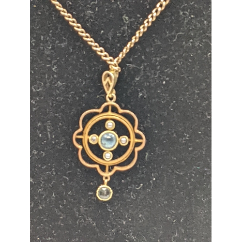 64 - A 15ct gold Edwardian pendant set with seed pearls and coloured stones on a necklace 7.5g Location:C... 