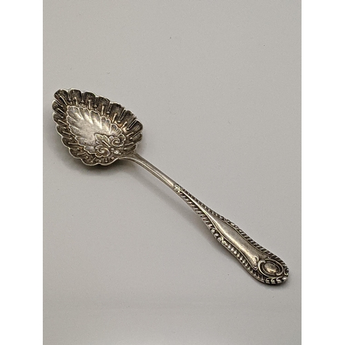 88 - Silver flatware to include a pierced and engraved fork hallmarked London 1899, together with an embo... 