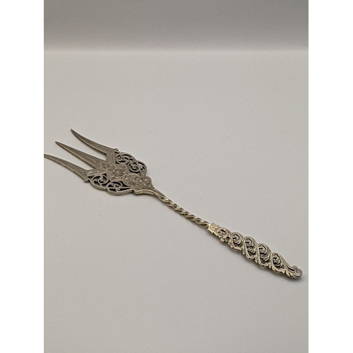 88 - Silver flatware to include a pierced and engraved fork hallmarked London 1899, together with an embo... 