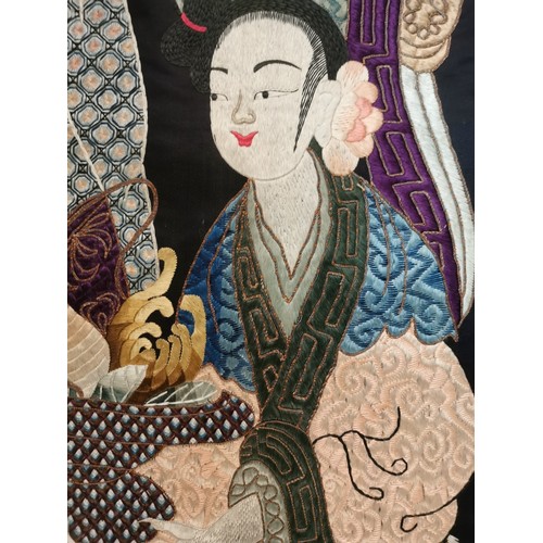 93 - A large Chinese Qing dynasty embroidered silk panel depicting the Queen Mother of the West, with an ... 