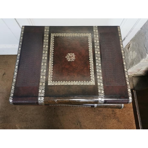 179 - A Maitland-Smith faux book side table, with three trompe l'oeil drawers, 62 cm high x 55 cm wide x 4... 