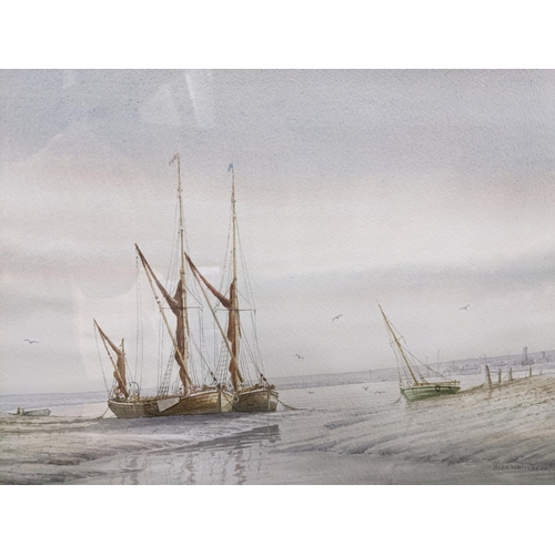 148 - Alan Whitehead - a group of three framed and glazed coastal watercolours depicting fishing craft moo... 