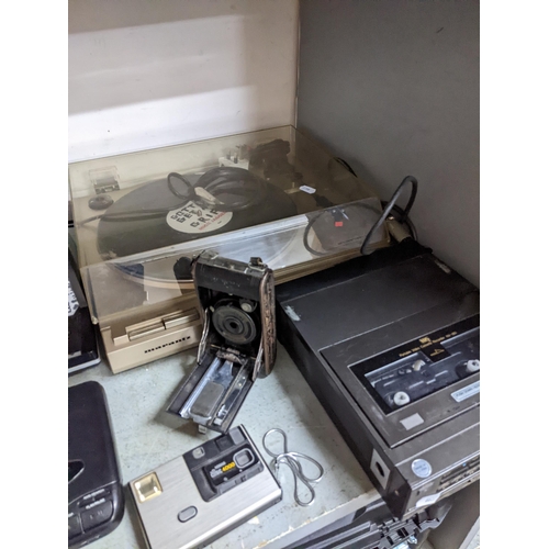 149 - A mixed lot to include a Panasonic VHS movie camera, Marantz record deck, Coronet folding vintage fi... 