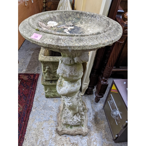 159 - A weathered cast stone bird bath with a figure column stamped Paul c 1929 Location:G