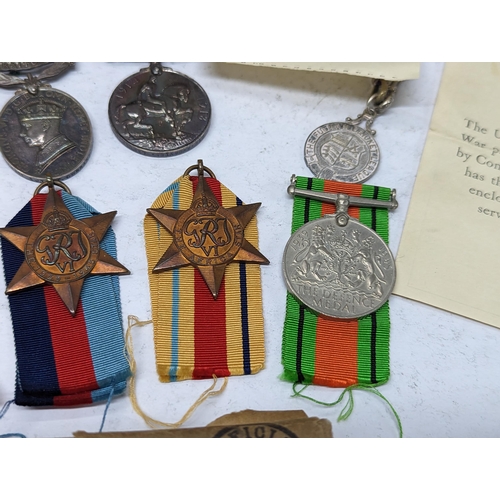 351 - A group of WWII medals to include 1939-1945 British War medals, the Defence Medal, Campaign stars to... 