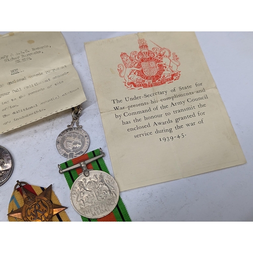 351 - A group of WWII medals to include 1939-1945 British War medals, the Defence Medal, Campaign stars to... 