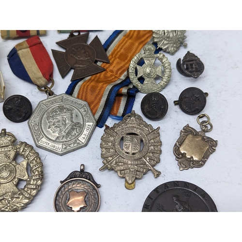 353 - A mixed lot of late 19th/early 20th century British Military related items to include Rifle Brigade ... 